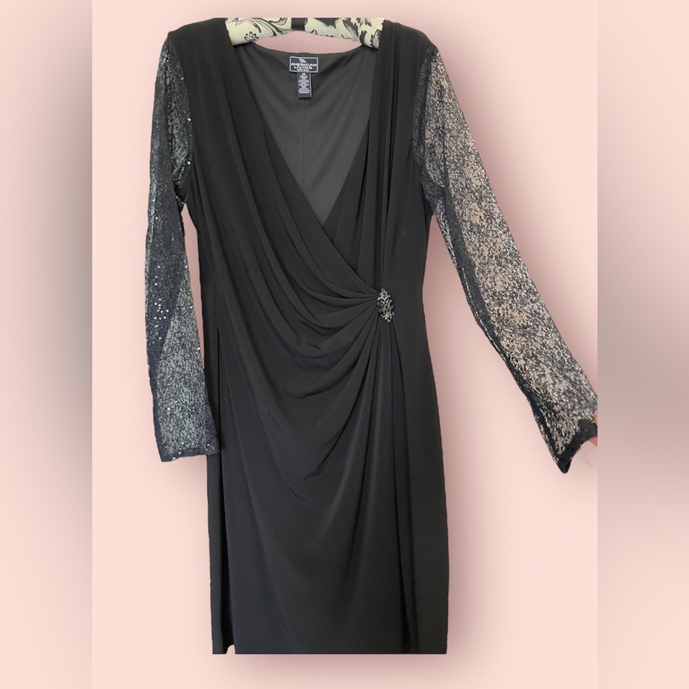 BE A HIT 4 THE HOLIDAYS in this sexy DRESS!Sequined, sheer sleeves, jewel accent